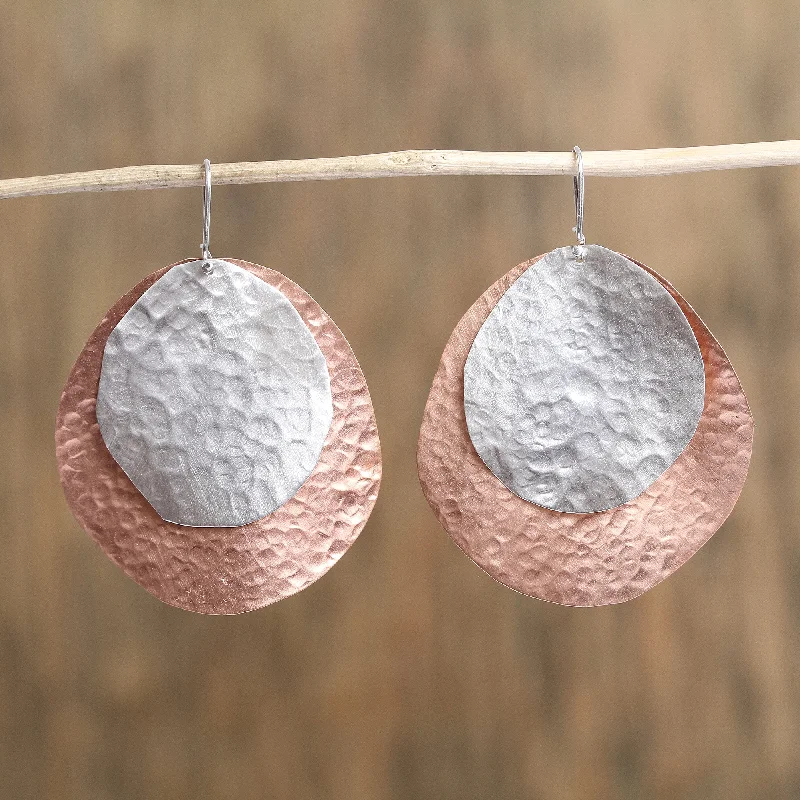 Elegant Rose Gold Jewelry For A Stylish Touch Rippling Eclipse Sterling Silver and Copper Dangle Earrings from Mexico