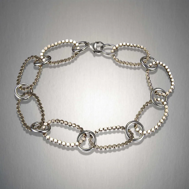 Breathtaking Jewelry, Breathtaking Prices H61 - Mixed Metal Dotted Link Bracelet